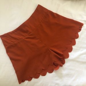 Orange scalloped shorts
